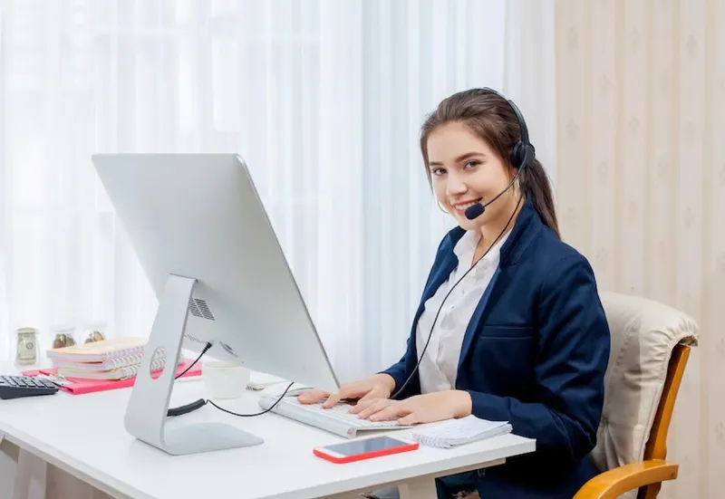 Customer support representative with headset ready to help